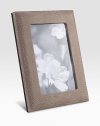 Display your memories in this handmade frame, wrapped in viper-printed nubuck leather with sturdy metal easel and convenient rear drop-down door for easy access.LeatherMade in USA DIMENSION INFORMATION 4 X 65 X 7