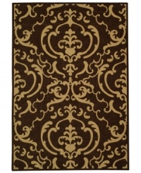 Safavieh takes classic beauty outside of the home with this elegant rug, created with a specially designed sisal weave. In deep chocolate brown and beige colorways, this beautiful piece makes the most of any outdoor patio, porch or balcony. (Clearance) Safavieh takes classic beauty outside of the home with this elegant rug, created with a specially designed sisal weave. In deep chocolate brown and beige colorways, this beautiful piece makes the most of any outdoor patio, porch or balcony. (Clearance)