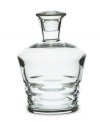 Classic technique, modern beauty. Crafted of fine Baccarat crystal, the Lola decanter pairs horizontal wedge cuts with a  silhouette that radiates grace and sophistication.