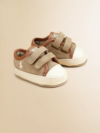These essential sneakers are rendered in plush leather with matching details and pony embroidery to create a classic heritage look.Double grip-tape closureLeather upperLeather liningLeather solePadded insoleImported These essential sneakers are rendered in plush leather with matching details and pony embroidery to create a classic heritage look.Double grip-tape closureLeather upperLeather liningLeather solePadded insoleImported