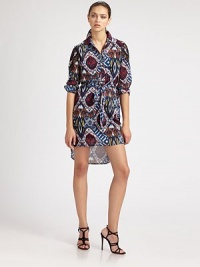 This classic shirtdress silhouette is printed with a colorful, batik-inspired pattern.Shirt collarButton frontLong sleeves with lace insets and button cuffsSelf tie beltCurved hemlineInverted back pleatFully linedAbout 27 from natural waistPolyesterDry cleanMade in USA of imported fabricModel shown is 5'11 (180cm) wearing US size 4. This classic shirtdress silhouette is printed with a colorful, batik-inspired pattern.Shirt collarButton frontLong sleeves with lace insets and button cuffsSelf tie beltCurved hemlineInverted back pleatFully linedAbout 27 from natural waistPolyesterDry cleanMade in USA of imported fabricModel shown is 5'11 (180cm) wearing US size 4.