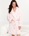 Treat yourself to the luxury of a hotel robe at home. Tommy Hilfiger designed this short robe in a super soft plush knit and added plaid for the signature style you love.