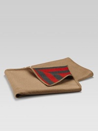 A soft, furry blend of cotton with a little silk offers pure Gucci style to wrap your baby in luxury.Solid color with crest on one side, signature stripes on the other 48L X 36W 95% cotton/5% silk Made in Italy A soft, furry blend of cotton with a little silk offers pure Gucci style to wrap your baby in luxury.Solid color with crest on one side, signature stripes on the other 48L X 36W 95% cotton/5% silk Made in Italy