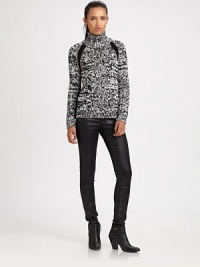 Extra-fine marled wool knit in a fitted turtleneck pullover.TurtleneckRalgan sleevesRibbed trimPullover styleAbout 25 from shoulder to hemMerino woolDry cleanImportedModel shown is 5'11 (180cm) wearing US size Small. Extra-fine marled wool knit in a fitted turtleneck pullover.TurtleneckRalgan sleevesRibbed trimPullover styleAbout 25 from shoulder to hemMerino woolDry cleanImportedModel shown is 5'11 (180cm) wearing US size Small.