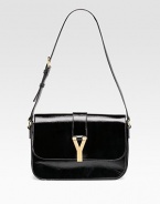 A classic design in gently textured patent leather with goldtone Y closure.Adjustable shoulder strap, 8¾ drop Magnetic snap on flap Open pocket under flap Two inside compartments Suede lining 11W X 7H X 2D Made in Italy