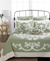 Serene green dream. With a look of whimsical beauty, this Aliani quilt boasts a luxurious loop embroidery with fluid flourish designs.