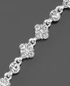 Add polish with this lovely antique-inspired crystal cluster, silvertone bracelet. Length measures 7-1/4 inches.