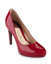 Combining serious style and comfort, these Cole Haan platform pumps shine, workday or weeknight. Combining serious style and comfort, these Cole Haan platform pumps shine, workday or weeknight.