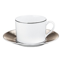 An icon of grand rich tradition of excellence, Bernardaud embodies one of the most innovative spirits among French luxury houses today. A trendsetter in design, it's porcelain collections are characterized by original forms, capturing the essence of their time. Inspired by distant deserts and drawn from timeless landscapes, Dune still bears the caress of the wind on the sand on its wide borders. With its pearly reflection and its subtle texture, the Limoges porcelain vibrates with a soft light. Based in white, classic, yet modern, Dune will forever dress your table with style. An icon of grand rich tradition of excellence, Bernardaud embodies one of the most innovative spirits among French luxury houses today. A trendsetter in design, it's porcelain collections are characterized by original forms, capturing the essence of their time. Inspired by distant deserts and drawn from timeless landscapes, Dune still bears the caress of the wind on the sand on its wide borders. With its pearly reflection and its subtle texture, the Limoges porcelain vibrates with a soft light. Based in white, classic, yet modern, Dune will forever dress your table with style.