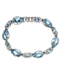 Refreshing hues for the season. Givenchy's gorgeous flex bracelet features pear-shaped aqua crystals and round-cut flecks of sapphire crystals. Set in imitation rhodium-plated mixed metal. Approximate length: 7-1/4 inches. Refreshing hues for the season. Givenchy's gorgeous flex bracelet features pear-shaped aqua crystals and round-cut flecks of sapphire crystals. Set in imitation rhodium-plated mixed metal. Approximate length: 7-1/4 inches.