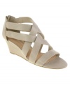 A priceless wedge. CL by Laundry's Treasure Chest wedge sandals are both fun and refined.