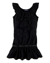 A superbly soft jersey-knit dress is adorned with a cascade of ruffles and shiny threading along the drop waist for a shimmering effect. A superbly soft jersey-knit dress is adorned with a cascade of ruffles and shiny threading along the drop waist for a shimmering effect.
