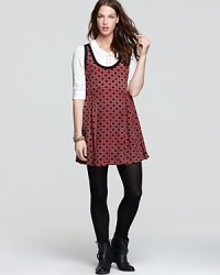 This daisy-print Free People people dress seamlessly translates from summer to fall--a peter pan-collared blouse layered underneath lends charm (and warmth). This daisy-print Free People people dress seamlessly translates from summer to fall--a peter pan-collared blouse layered underneath lends charm (and warmth).
