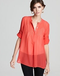 This season, a sheer French Connection top in ravishing red adds a jolt of hue for a bold new you. This season, a sheer French Connection top in ravishing red adds a jolt of hue for a bold new you.