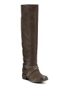 Boutique 9's studded wrap boots echoe Wild West style. Tame it--just a little--with a feminine dress.