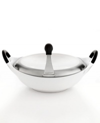 A new look. Give your kitchen a modern update with this incredibly light and sophisticated cast aluminum covered wok. Providing fast & even heat distribution, the sleek vessel features a phenolic resin stay-cool handle, easy-pour spout and a striking silhouette that creates an art show on the stovetop. 3-year warranty. A new look. Give your kitchen a modern update with this incredibly light and sophisticated cast aluminum covered wok. Providing fast & even heat distribution, the sleek vessel features a phenolic resin stay-cool handle, easy-pour spout and a striking silhouette that creates an art show on the stovetop. 3-year warranty.