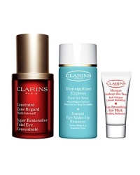 Reduce puffiness, dark circles and crow's feet with Clarins' forever young formula for eyes. Soothe, de-congest and tone eye contours with the ultimate five-minute mask. Eliminate every last trace of eyeshadow and mascara with a make-up remover that's easy on the eyes.Set includes:- Full-Size Total Eye Concentrate- Sample-Size Skin-Smoothing Eye Mask- Trial-Size Instant Eye Make-Up Remover Reduce puffiness, dark circles and crow's feet with Clarins' forever young formula for eyes. Soothe, de-congest and tone eye contours with the ultimate five-minute mask. Eliminate every last trace of eyeshadow and mascara with a make-up remover that's easy on the eyes.Set includes:- Full-Size Total Eye Concentrate- Sample-Size Skin-Smoothing Eye Mask- Trial-Size Instant Eye Make-Up Remover