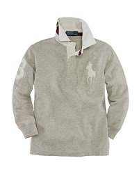 A classic rugby is updated with heritage details for an always-preppy look. A classic rugby is updated with heritage details for an always-preppy look.