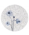 A fresh take on floral patterns, the Watercolors Indigo Blue salad plate features painterly blossoms in shades of blue against a lively geometric design. White bone china in an ultra-modern shape provides a sleek foundation for a look that's irresistibly fun. (Clearance)