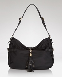 Daytime style doesn't get easier than this Juicy Couture bag, crafted of perfectly practical nylon in a shoulder-right shape. Daytime style doesn't get easier than this Juicy Couture bag, crafted of perfectly practical nylon in a shoulder-right shape.