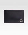 Italian calfskin leather card case with signature gancini ornament detail.Three card slotsLeather4W x 3HMade in Italy