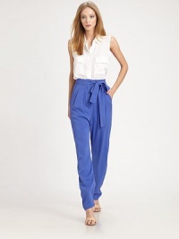 Vibrant silk elegantly tailored with a high waist, pleated front and chic tapered leg.High waistSelf-beltZip-flyRise, about 11Inseam, about 34SilkDry cleanImportedModel shown is 5'10 (177cm) wearing US size 4.OUR FIT MODEL RECOMMENDS ordering true size. Vibrant silk elegantly tailored with a high waist, pleated front and chic tapered leg.High waistSelf-beltZip-flyRise, about 11Inseam, about 34SilkDry cleanImportedModel shown is 5'10 (177cm) wearing US size 4.OUR FIT MODEL RECOMMENDS ordering true size.