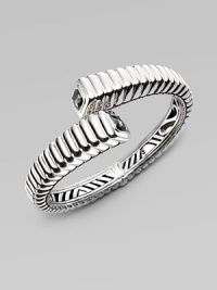 A ridged design with faceted hematite caps. Sterling silver Hematite Kick mechanism closure Diameter, about 2¼ Imported A ridged design with faceted hematite caps. Sterling silver Hematite Kick mechanism closure Diameter, about 2¼ Imported