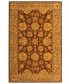 Bold colors, classic patterns. Featuring a traditional vine-and-blossom motif inspired by ancient Persian designs, this area rug from Safavieh adds a touch of drama and heirloom elegance any living space. Tufted in India from pure wool, it's sure to set just the right tone. (Clearance)