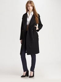 Oversized silhouette with an unfinished hem, defined by a dropped waist and wide belt. JewelneckDouble-breasted button frontEpaulettes on shouldersFlap over one shoulderLong sleevesDropped waist with loops and detachable beltAbout 39 from shoulder to hem75% wool/20% nylon/5% cashmereDry cleanImportedModel shown is 5'10 (177cm) wearing US size 4. Oversized silhouette with an unfinished hem, defined by a dropped waist and wide belt. JewelneckDouble-breasted button frontEpaulettes on shouldersFlap over one shoulderLong sleevesDropped waist with loops and detachable beltAbout 39 from shoulder to hem75% wool/20% nylon/5% cashmereDry cleanImportedModel shown is 5'10 (177cm) wearing US size 4.