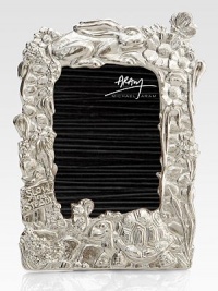 A nostalgic reminder of youth and fairytale lore, this hand-cast design of nickel-plated metal is sure to inspire story-telling for years to come.From the Baby Heirloom CollectionNickel-plated metalConvertible frame fits 4 X 6 or 5 X 7 photos10H X 7WImported A nostalgic reminder of youth and fairytale lore, this hand-cast design of nickel-plated metal is sure to inspire story-telling for years to come.From the Baby Heirloom CollectionNickel-plated metalConvertible frame fits 4 X 6 or 5 X 7 photos10H X 7WImported