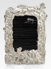 A nostalgic reminder of youth and fairytale lore, this hand-cast design of nickel-plated metal is sure to inspire story-telling for years to come.From the Baby Heirloom CollectionNickel-plated metalConvertible frame fits 4 X 6 or 5 X 7 photos10H X 7WImported