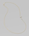 A wispy chain of 14k yellow gold features a cross pendant, encrusted in sparkling diamonds, set askew for a modern edge.Diamonds, .14 tcw 14k yellow gold Length, about 16 Pendant length, about ½ Spring ring clasp Made in USA