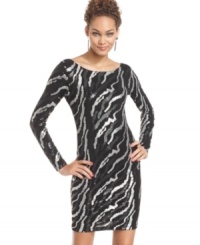 Long sleeves and a sequined pattern create a sophisticated look, but Jump's dress hides the the real surprise -- the ultra-low cutout back! Long sleeves and a sequined pattern create a sophisticated look, but Jump's dress hides the the real surprise -- the ultra-low cutout back!