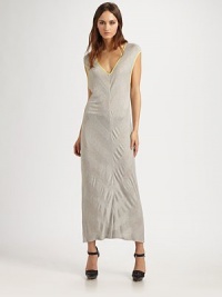Long, lightweight v-neck with cap sleeves, contrast trim and a slight v-back. V-neckCap sleevesSlight v-backAbout 36 from natural waistRayonDry cleanImportedModel shown is 5'10 (177cm) wearing US size Small. Long, lightweight v-neck with cap sleeves, contrast trim and a slight v-back. V-neckCap sleevesSlight v-backAbout 36 from natural waistRayonDry cleanImportedModel shown is 5'10 (177cm) wearing US size Small.