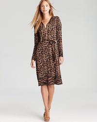 In a lively medley of animal prints, this MICHAEL Michael Kors dress enlivens your 9-to-5 style. Finish the look with polished pumps and get in step with the fashion pack. In a lively medley of animal prints, this MICHAEL Michael Kors dress enlivens your 9-to-5 style. Finish the look with polished pumps and get in step with the fashion pack.