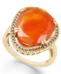 A splash of citrus spices up any look. Crafted in 14k gold over sterling silver, this asymmetrical carnelian stone (6-1/2 ct. t.w.) pops against a sparkling diamond frame (1/5 ct. t.w.). Size 7. A splash of citrus spices up any look. Crafted in 14k gold over sterling silver, this asymmetrical carnelian stone (6-1/2 ct. t.w.) pops against a sparkling diamond frame (1/5 ct. t.w.). Size 7.