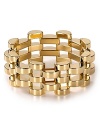 Boldly crafted open links in high-shine metal, this Michael Kors bracelet styles every look with classic glamour.