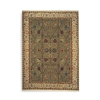 Modeled after the world's most prized antique textiles, this luxuriant Karastan rug lends opulence and heirloom beauty to your home. Surrounded by a light border to add depth and contrast, the abundant pattern depicts lush trees, flowers and vines. First introduced in 1928, the Original Karastan Collection established the highest standard for traditional Oriental machine woven rugs.