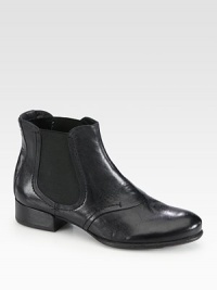 On-trend leather staple with elasticized gores for convenient on and off access. Self-covered heel, 1¼ (30mm)Leather upper with side elastic goresPull-on styleLeather lining and solePadded insoleImportedOUR FIT MODEL RECOMMENDS ordering one half size down as this style runs large. On-trend leather staple with elasticized gores for convenient on and off access. Self-covered heel, 1¼ (30mm)Leather upper with side elastic goresPull-on styleLeather lining and solePadded insoleImportedOUR FIT MODEL RECOMMENDS ordering one half size down as this style runs large.