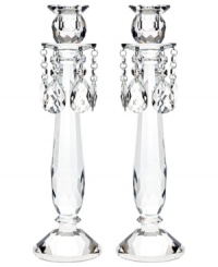 Truly stunning, Old Vienna candlesticks bring the opulence of ages past to today's most elegant interiors. A faceted crystal base and glistening crystal beads will become the focal point of any setting. From Lighting by Design. Truly stunning, Old Vienna candlesticks bring the opulence of ages past to today's most elegant interiors. A faceted crystal base and glistening crystal beads will become the focal point of any setting. From Lighting by Design.