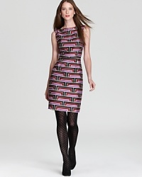 A bold retro print lends graphic impact to a classic kate spade new york sheath, flaunting a chic boat neckline and sleeveless silhouette for timeless elegance. A bold retro print lends graphic impact to a classic kate spade new york sheath, flaunting a chic boat neckline and sleeveless silhouette for timeless elegance.