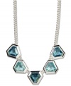 Drape your neck in cool blues. Pretty blue topaz glass accents bring an alluring look to this frontal necklace from Anne Klein. Set in silver tone mixed metal. Approximate length: 17-inches + 2-inch extender. Approximate drop: 3 inches
