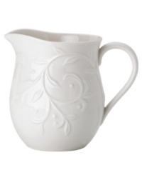 An elegant white-on-white pattern featuring an embossed vine motif and interior glaze lends the Opal Innocence Carved creamer to refined dining every day. An elegant white-on-white pattern featuring an embossed vine motif and interior glaze lends the Opal Innocence Carved creamer to refined dining every day.