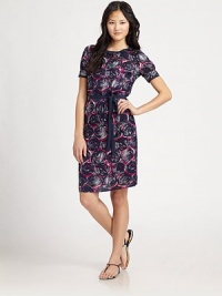 This beautifully printed silky style is cinched at the waist with a ribbon tie.Jewel necklineShort puffed sleeves with button cuffsContrast pipingContrast ribbon sashBack keyhole with button closureFully linedAbout 36¼ from shoulder to hem55% rayon/45% silkDry cleanImportedModel shown is 5'10 wearing US size 4.OUR FIT MODEL RECOMMENDS ordering true size. This beautifully printed silky style is cinched at the waist with a ribbon tie.Jewel necklineShort puffed sleeves with button cuffsContrast pipingContrast ribbon sashBack keyhole with button closureFully linedAbout 36¼ from shoulder to hem55% rayon/45% silkDry cleanImportedModel shown is 5'10 wearing US size 4.OUR FIT MODEL RECOMMENDS ordering true size.