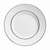 Vera Wang introduces Flirt fine bone china dinnerware. This platinum banded pattern features a modern scallop lace motif and a contemporary take on traditional lace work. Decoration on the inner verge of the accent plate, bread and butter and tea saucer adds a flirtatious touch of whimsy.