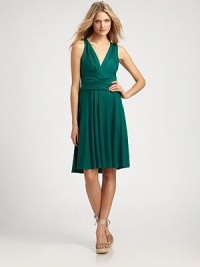 Soft, fluid jersey, tailored with a flattering full skirt and a plunging neckline.Surplice necklineSleevelessRuched waistbandGathered skirtFully linedAbout 37¾ from shoulder to hem93% lyocell/7% elastaneDry cleanImportedModel shown is 5'10½ (179cm) wearing US size Small. Soft, fluid jersey, tailored with a flattering full skirt and a plunging neckline.Surplice necklineSleevelessRuched waistbandGathered skirtFully linedAbout 37¾ from shoulder to hem93% lyocell/7% elastaneDry cleanImportedModel shown is 5'10½ (179cm) wearing US size Small.