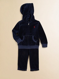 This coordinating athletic set includes a classic full-zip hoodie and a matching sweatpant in soft, cozy velour. Hoodie Attached hoodLong sleevesFull-zip frontSplit kangaroo pocketRibbed cuffs and hem Sweatpants Elasticized waist with tieMock fly87% cotton/13% polyesterMachine washImported This coordinating athletic set includes a classic full-zip hoodie and a matching sweatpant in soft, cozy velour. Hoodie Attached hoodLong sleevesFull-zip frontSplit kangaroo pocketRibbed cuffs and hem Sweatpants Elasticized waist with tieMock fly87% cotton/13% polyesterMachine washImported