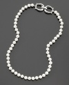 Add polish with a pretty glass pearl necklace (6 mm) from Lauren Ralph Lauren. Length measures 16 inches.