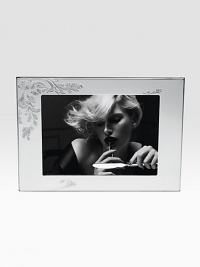 Showcase a favorite photograph in this elegant silverplated frame with etched floral detail. Holds 5X7 photograph Tarnish-proof Dust clean Made in ItalyDIMENSION INFORMATION3 X 4 (4 X 5 overall)4 X 6 (5 X 7 overall) Showcase a favorite photograph in this elegant silverplated frame with etched floral detail. Holds 5X7 photograph Tarnish-proof Dust clean Made in ItalyDIMENSION INFORMATION3 X 4 (4 X 5 overall)4 X 6 (5 X 7 overall)