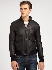 Timeless silhouette of butter-soft leather, with dual front pockets and quilted detailing. Front zipZip front pocketDual flap pocketsRibbed trim at cuffs and hemAbout 25 from shoulder to hemLamb leatherFully linedDry cleanImported Timeless silhouette of butter-soft leather, with dual front pockets and quilted detailing. Front zipZip front pocketDual flap pocketsRibbed trim at cuffs and hemAbout 25 from shoulder to hemLamb leatherFully linedDry cleanImported